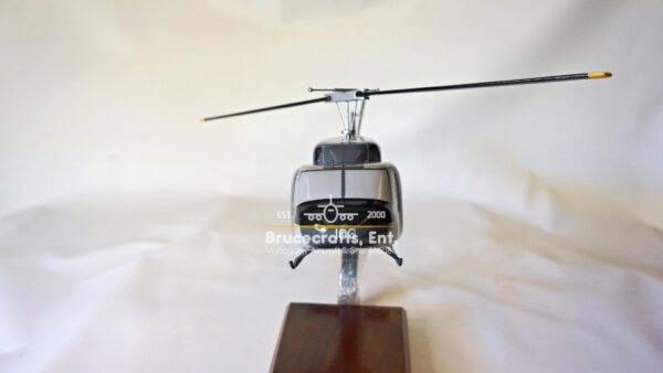 Model of UH-1N Twin Huey US NAVY 103 Aircraft with detailed craftsmanship.